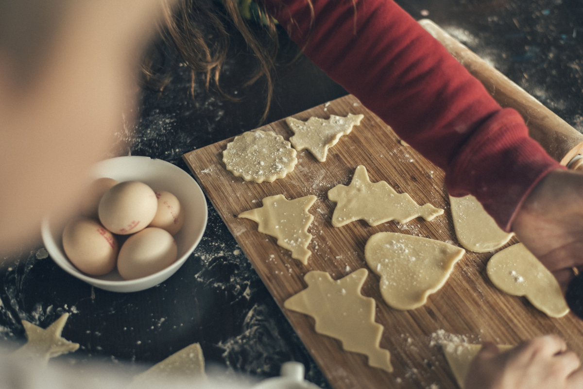 Sugar cookies on a cutting board courtesy of SOS Children's Villages