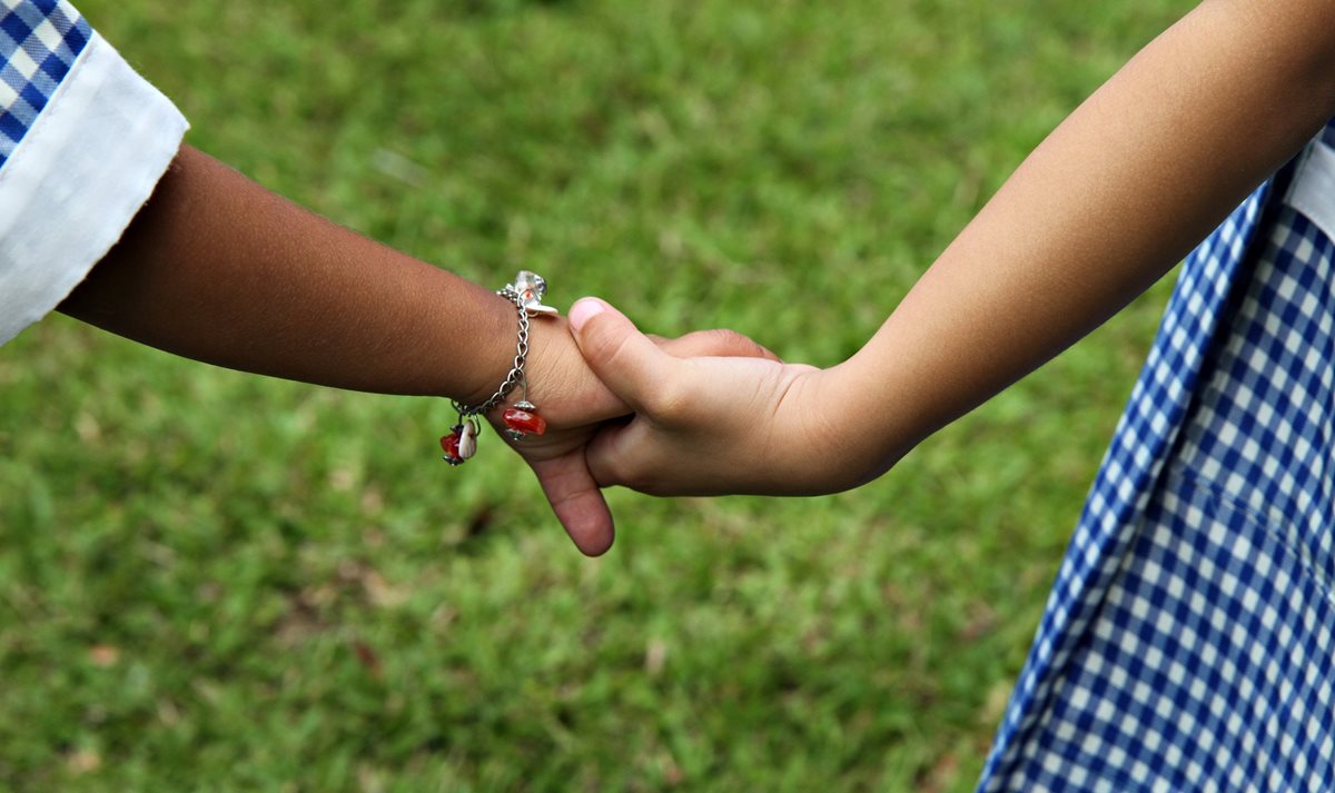 Children holding hands