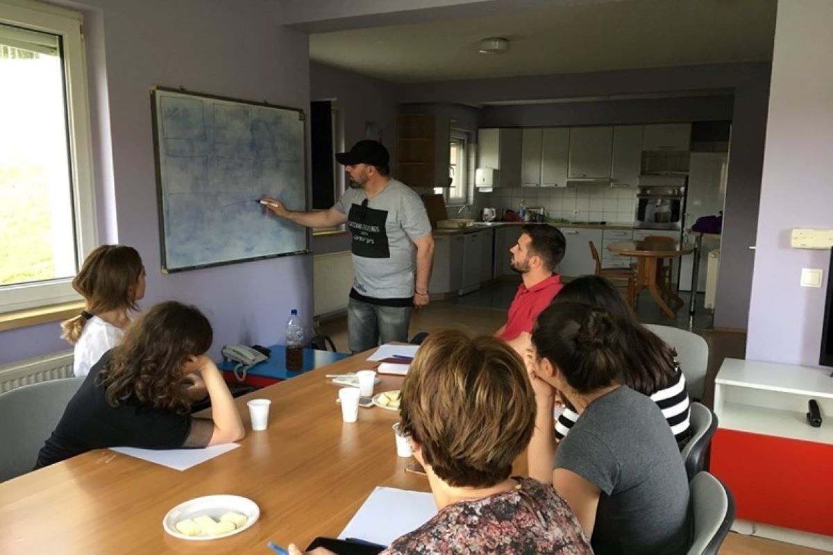 Young people gather together in workshop