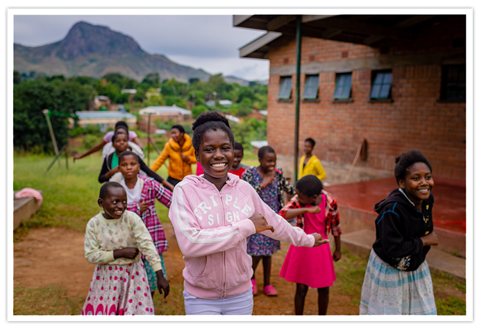 Sponsored children playing in their village in Africa