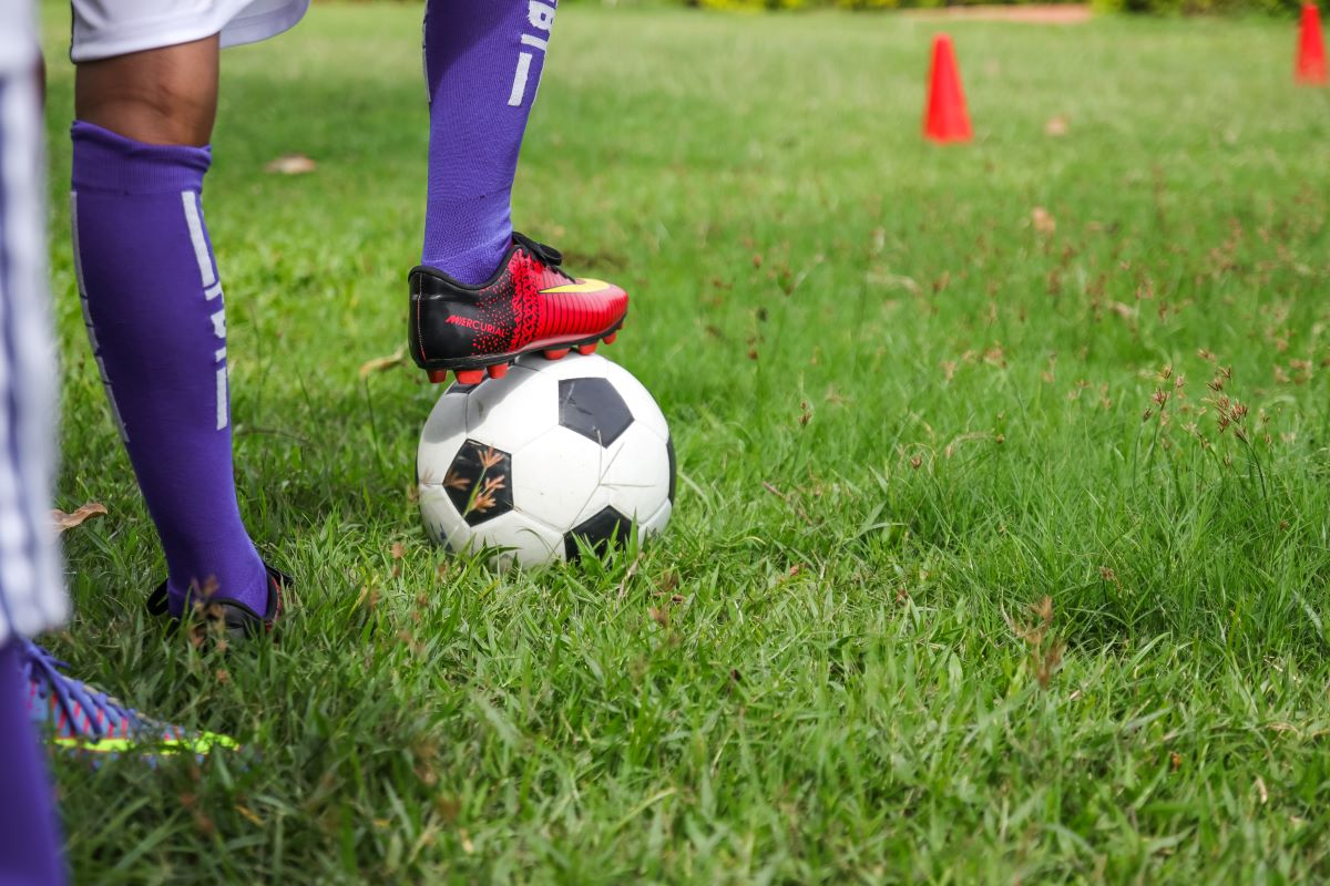 Child playing soccer
